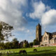 Warneton : nature landscape and Saints Pierre and Paul church - static time lapse