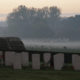 Misty morning over war military cemetery near Ploegsteert Wood - static real time