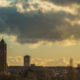 Sunset light with beautiful sky on working class district in Mouscron city - static time lapse