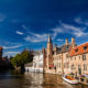 Rozendhoedkaai : junction of canals and medieval buildings skyline - static time lapse