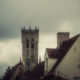 Beautiful scenic walk in Bruges : belfry tower seen from Groenerei - static time lapse