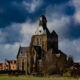 Heuvelland landscape : Saint-Nicholas church of Mesen village - static time lapse