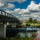 Landscape of the Leie river banks and ring road bridge near Kortrijk centre - static time lapse