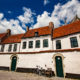 Fluffy clouds time lapse above flemish beguinage in the heart of Kortrijk - static time lapse