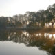 Sport in nature : running session after sunrise along Ypres river - static real time