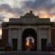 Beautiful time lapse of impressive Menin Gate arch with sunset rays - static time lapse