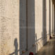 Sunset enlightening the Ypres Menin Gate WW1 Memorial loggias walls - dolly shot real time