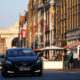 Ypres city center :  main street with traffic coming to the Grote Markt - static real time