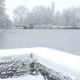 Winter landscape : lake and trees frozen along Ypres ramparts walkway - dolly shot real time