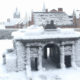 The bronze model of the Ypres Menin Gate Memorial after snowfall - dolly shot real time