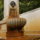 Spa city center : public drinking fountain with iron rich  mineral water - dolly shot real time