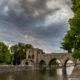 Stormy sky on the emblematic Pont des Trous bridge of Tournai - static time lapse