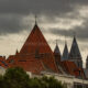 Skyline with roofs, turrets and towers in Tournai city historic center - static time lapse