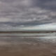 Marine landscape : sand and clouds of De Panne beach at low tide - static time lapse