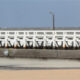 Sea, sand and sun : the Nieuwpoort west staketsel pier in the wind - static real time