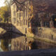 Bruges in autumn : romantic evening light on the Groenerei canal - dolly shot real time