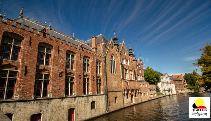 Old buildings alongside Bruges waterway