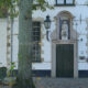 Bruges Beguinage : typical front house architecture and decoration - dolly shot real time