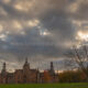 End of an autumn sunny day in Ooidonk castle beautiful gardens - static time lapse