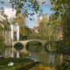 Bruges in autumn picturesque view : Wijngaarde square and bridge - dolly shot real time